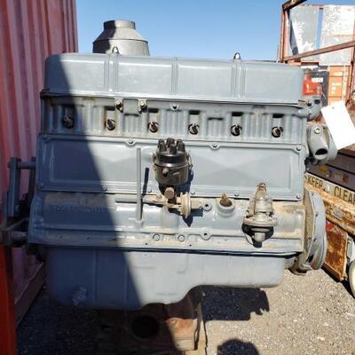 
#6702 â€¢ 235 GM Engine And Engine Stand