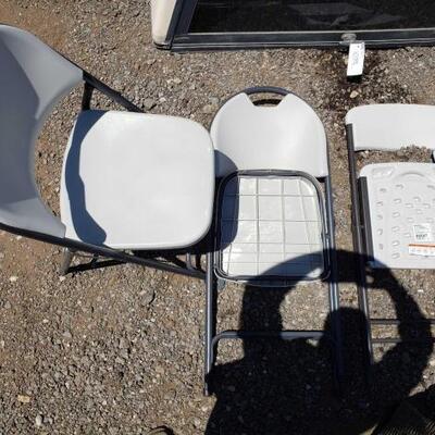 #60004 â€¢ Three Plastic Chairs