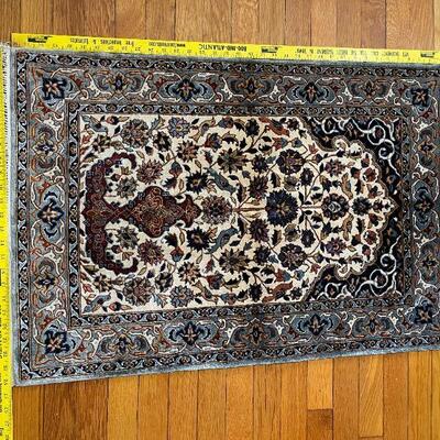 Silk, hand woven Persian rug. Appraisal information is available. 