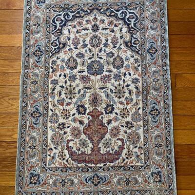 Silk, hand woven Persian rug. Appraisal information is available. 