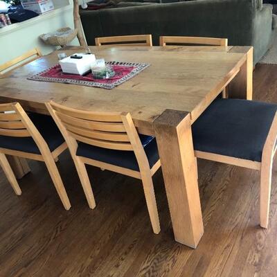 This is one solid Crate and Barrel  pine table. 6 matching chairs. $600.00