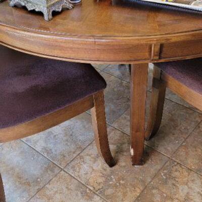 Round wood dining chair and 4 wood padded chairs