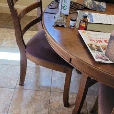 Round wood dining chair and 4 wood padded chairs