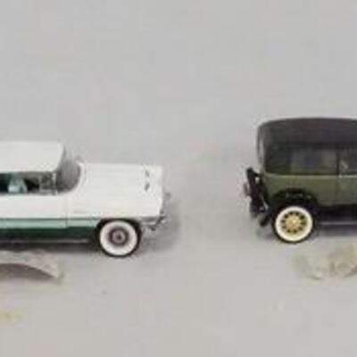 1161	LOT OF FOUR FRANKLIN MINT 1:24 SCALE DIE CAST PRECISION MODELS. LOT INCLUDES. A 1935 AUBURN 851 SPEEDSTER, A 1955 PACKARD CARIBEAN,...