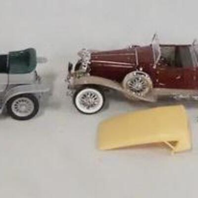 1160	LOT OF FOUR FRANKLIN MINT PRECISION DIE CAST MODEL CARS. LOT INCLUDES A 1:43 SCALE MACK B-61 DUMP TRUCK, 1907 ROLLS-ROYCE SILVER...