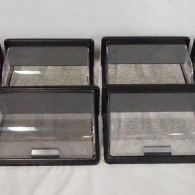 1101	LOT OF EIGHT DISPLAY CASES FOR MODEL CARS. EACH DISPLAY CASE HAS A PLAQUE W/ THE NAME OF A SPECIFIC CAR. LOT INCLUDES CASES FOR;...