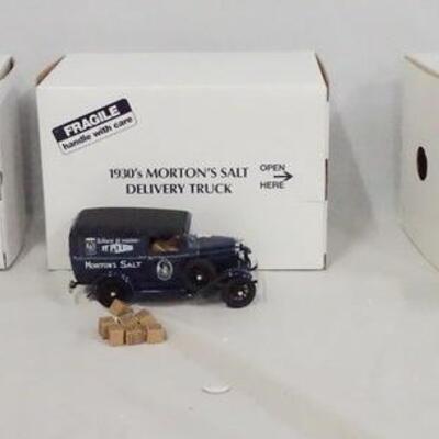 1158	LOT OF THREE DIE CAST DANBURY MINT DELIVER TRUCK REPLICAS. LOT INCLUDES; 1931 U.S. MAIL TRUCK, 1930S MORTONS SALT DELIVER TRUCK...