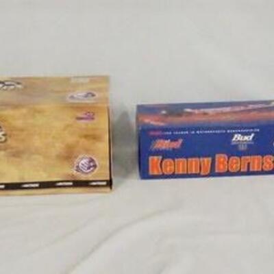 1129	FOUR NASCAR MODELS IN BOXES
