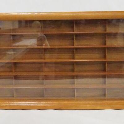 1107	THOMAS PACCONI 1900-2000 CLASSICS DISPLAY CASE FOR MODEL CARS. APP. 23 IN X 12 1/2 IN, 2 3/4 IN DEEP.  

