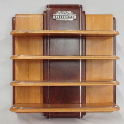 1108	THE WORLDS GREATEST LUXURY CARS DISPLAY SHELF. APP. 20 IN X 18 1/2 IN, 5 IN DEEP. 
