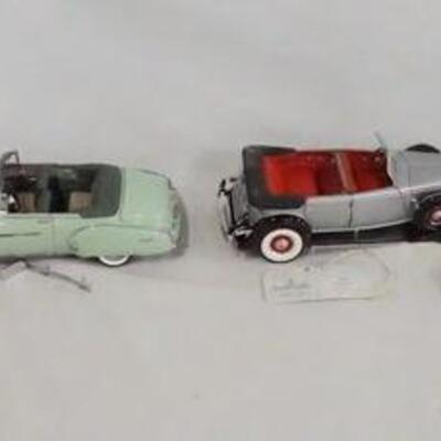 1128	LOT OF FOUR FRANKLIN MINT PRECISION 1:24 SCALE DIE CAST MODEL CARS. AS FOUND
