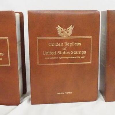 1027	LOT OF THREE GOLDEN REPLICAS OF THE UNITED STATES STAMP ALBUMS. ALBUMS CONTAIN FIRST DAY COVERS W/ GOLDEN REPLICA STAMPS ALONG W/...
