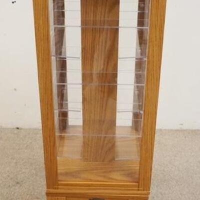 1122	OAK FLOOR/COUNTER TOP REVOLVING DISPLAY CABINET W/TAG THOMAS CLASSICS, 41 IN HIGH X 12 IN X 12 IN
