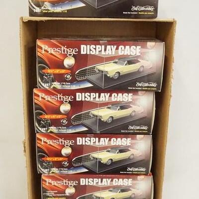1127	LOT OF 6 PRESTIGE DISPLAY CASES IN BOXES 13 1/2 IN X 6 IN X 5 IN
