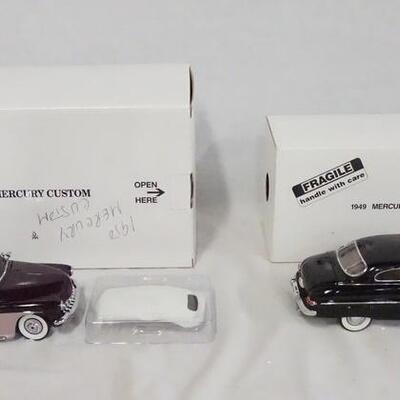 1151	LOT OF TWO DIE CAST 1:24 SCALE MODEL CARS FROM THE DANBURY MINT. LOT INCLUDES; 1949 MERCURY CLUB COUPE & 1950 MERCURY CUSTOM. 
