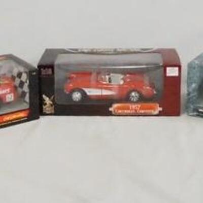 1262	LOT OF FIVE DIE CAST 1:18 SCALE MODEL CARS IN ORIGINAL BOXES
