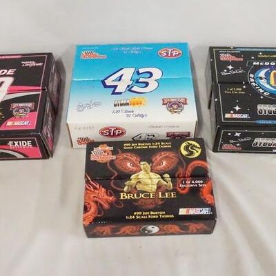 1071	LOT OF EIGHT RACING CHAMPIONS LIMITED EDITION 1:24 SCALE NASCAR MODEL CARS IN ORIGINAL BOXES. 
