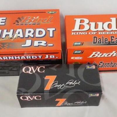 1050	LOT OF THREE REVELL NASCAR DIE CAST MODEL CARS. LOT INCLUDES TWO LIMITED EDITION DALE ERNHARDT JR. MODELS 1:18 & 1:24 SCALE. ALL...