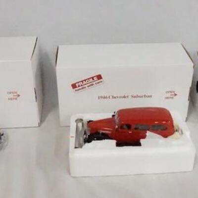 1153	LOT OF THREE DIE CAST 1:24 SCALE CHEVROLET MODELS FROM THE DANBURY MINT. LOT INCLUDES; 1946 SUBURBAN, 1941 SPECIAL DELUXE, &...