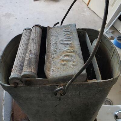antique mop bucket and ringer