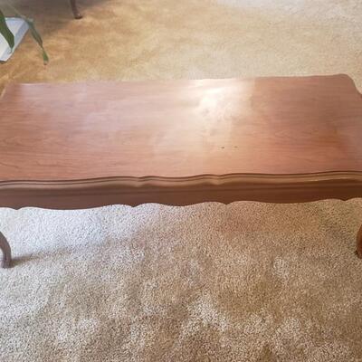 This elegant coffee table matches the two end tables in this sale. Our client said she bought the entire set in 1966. The table measures...