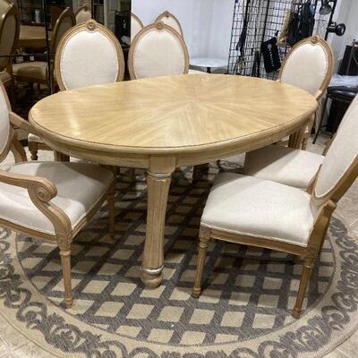 Dining set by Drexel with 8 matching chairs, 2 leaves and protector pads