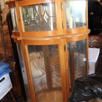 curved glass curio cabinet, two doors and two lights, with key, mirror back