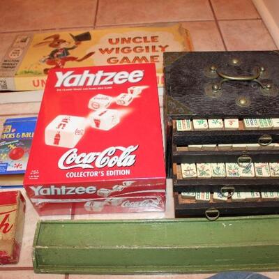 lots of games, recent and vintage. note the bone-covered Mahjong set