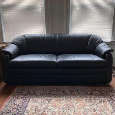 Leather recliner, in good shape.  Shows some wear but not a lot.
