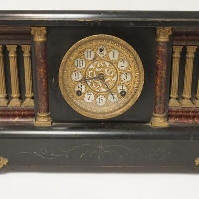 1259	VICTORIAN MANTLE CLOCK W/ ORNATE BRASS OVERLAY ON THE FACE.

