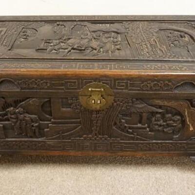 1218	ANTIQUE ASIAN CAMPHOR WOOD CHEST W/ ORNATE SCENIC CARVING, & DOVETAILED FIGURAL FEET W/ TRAY. 18 IN X 36 IN, 17 IN H  

