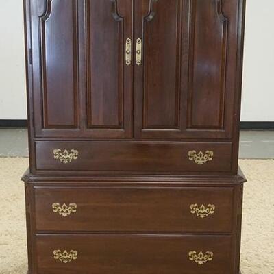 1206	ETHAN ALLEN BLACK CHERRY WARDROBE HAS TWO PANELED DOORS OVER THREE DRAWERS THE INTERIOR HAS THREE DIVIDED COMPARTMENTS & TWO...