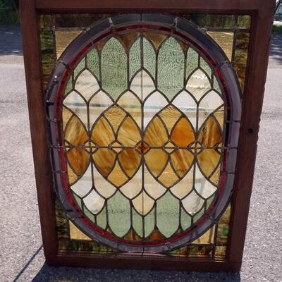 1052	STAINED GLASS WINDOW, 30 IN X 38 1/2 IN
