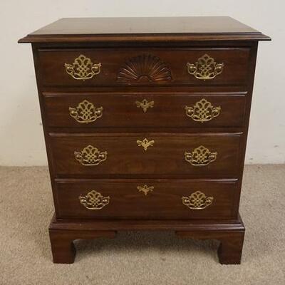 1211	HARDEN FOUR DRAWER WALNUT BEDSIDE CHEST ON HIGH BRACKET FEET AND SHELL CARVED TOP DRAWER. 26 IN W, 16 IN D, 31 IN H
