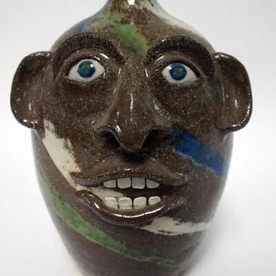 1152	JOE REINHARAT GROTESQUE FACE JUG, MULTI COLOR SWIRL UGLY FACE JUG, VALE N.C.,10 IN HIGH, SIGNED AND INSCRIBED ON BOTTOM * 8-5-2001...