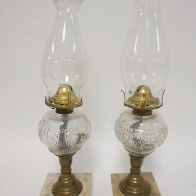 1064	PAIR OF ANTIQUE OIL LAMPS ON MARBLE BASES
