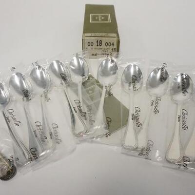 1017	CHRISTOFLE PARIS 12 5 1/2 IN AFTER DINNER SPOONS, UNOPENED, SEALED IN BAGS, NEVER USED IN BOX
