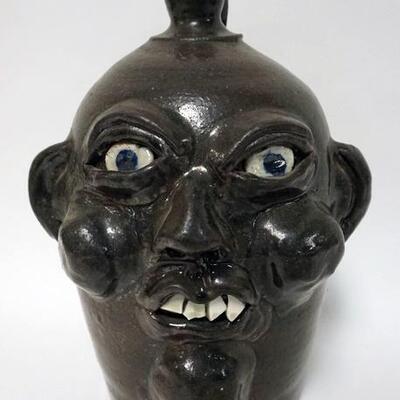 1158	HARROLD AND GRACE NELL HEWELL GROTESQUE FACE JUG, GILLSVILLE GA, SIGNED AND DATED ON BOTTOM 99, 12 IN HIGH
