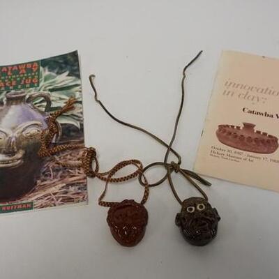 1165	GROUP OF 2 POTTERY PENDANTS & CATALOGS. BARRY G. HOFFMAN & CATAWBA VALLEY POTTERY 
