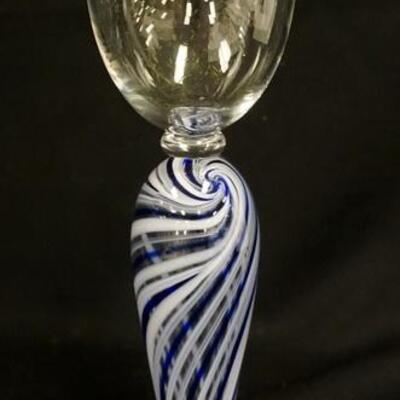 1285	LARGE BLOWN GOBLET	LARGE LIMITED EDITION SIGNED BLOWN GOBLET HAS HOLLOW BLOWN STEM W/ BLUE & WHITE SWIRLS 12 1/8 IN H 
