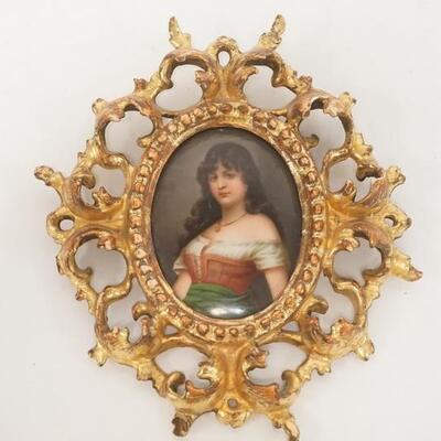 1063	OVAL HAND PAINTED PORCELAIN PORTRAIT IN GILT WOOD FRAME, 8 IN X 6 1/2 IN OVERALL
