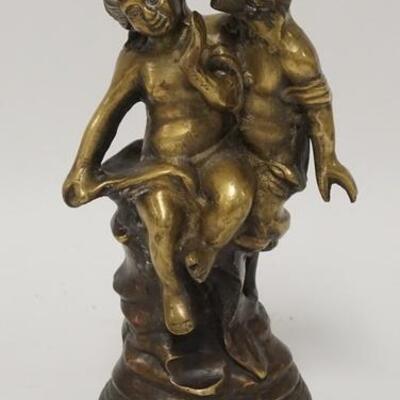 1262	BRONZE OF A MAN & WOMAN. 9 3/4 IN H 
