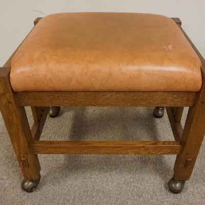 1189	LEATHER MISSION STYLE STOOL. SOME WEAR TO THE LEATHER. 19 IN X 15 IN, 17 IN H 
