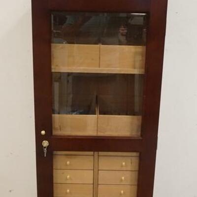 1201	QUALITY IMPORTERS VERONA CIGAR HUMIDOR UNUSED CABINET HUMIDOR W/ BEVELED GLASS LOCKING DOOR 70 IN X 22 1/2 IN W 16 1/2 IN DEEP
