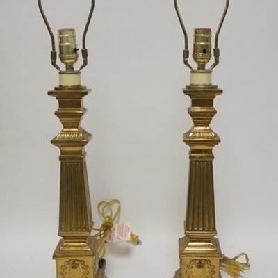 1271	PAIR OF CANDLESTICK FORM LAMPS	PAIR OF CANDLESTICK FORM LAMPS W/ BRASS FINISH. 20 1/2 IN H 
