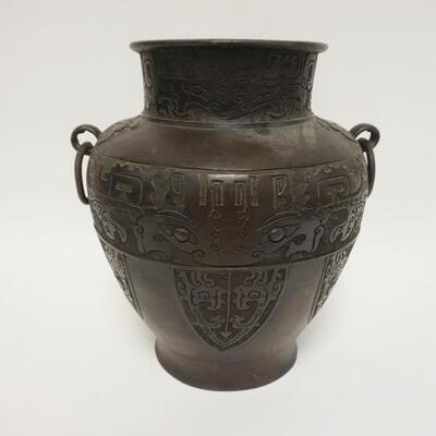 1002	ANTIQUE BRONZE DOUBLE RING HANDLED URN WITH CHARACTER MARKS ON BASE. PREVIOUSLY DRILLED FOR A LAMP, 12 IN HIGH
