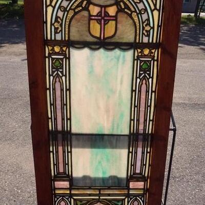 1053	STAINED GLASS WINDOW, 22 3/4 IN X 52 IN

