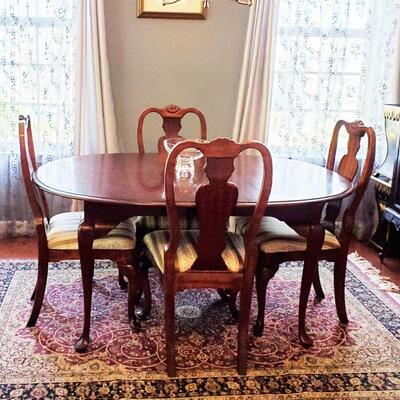 Mahogany dining room table with extra leaves $300