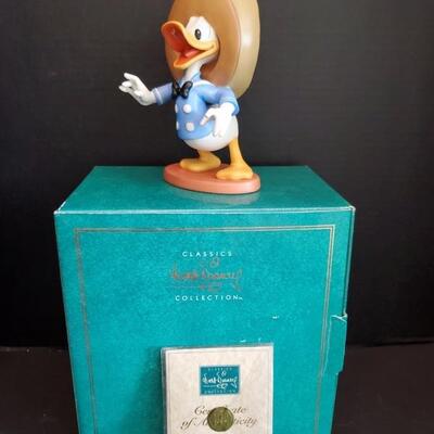 Walt Disney Classics Collection featuring Amigo Donald from The Three Caballeros film. Figure has remained in box and was only opened to...