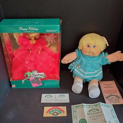 Original Cabbage Patch Michelle Rosalinda born October 1st 1984. Includes birth certificate and paperwork. Holiday Barbie 1990 in...